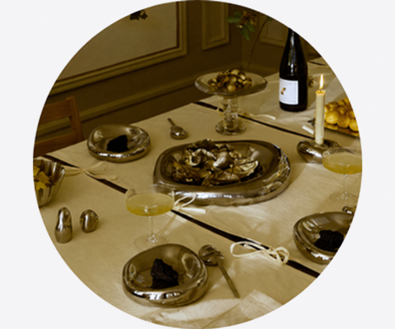 Elegant holiday dining table with decorative tableware, candlelight and festive table setting